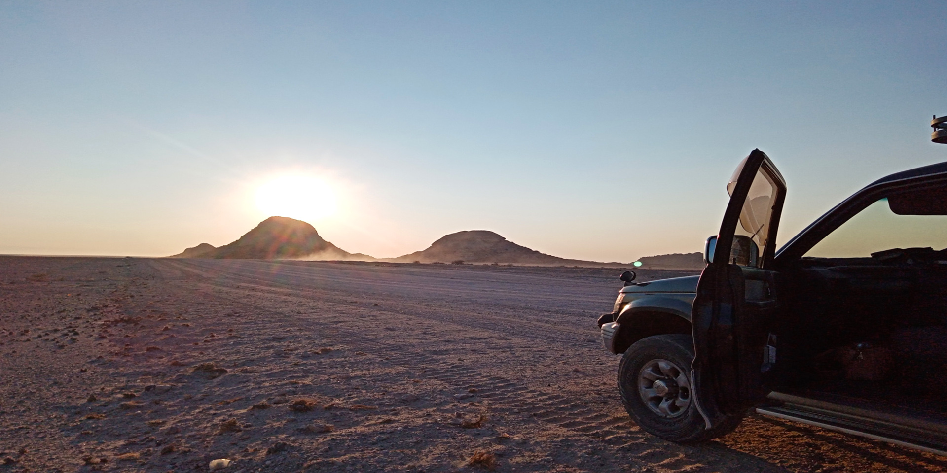 Car in the Namibian landscape